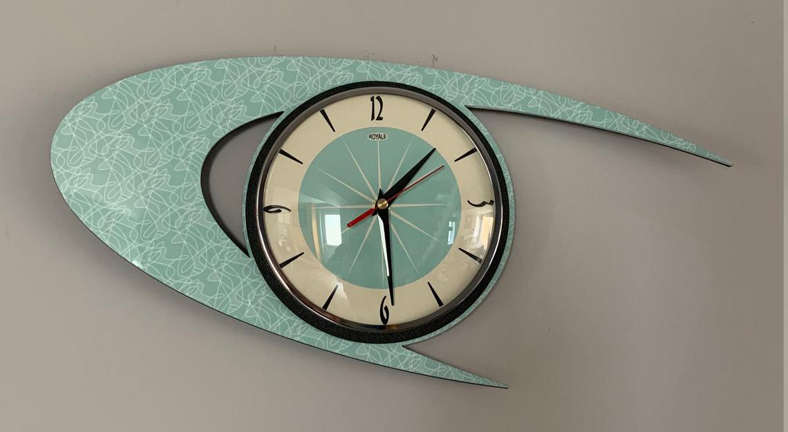 Turquoise boomerang clock